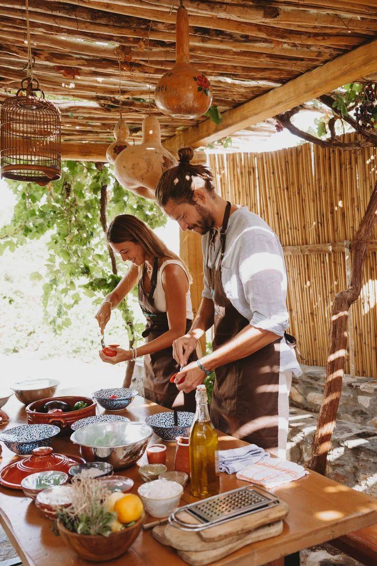 Tourists cooking together